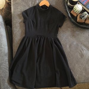 Black short sleeved dress.